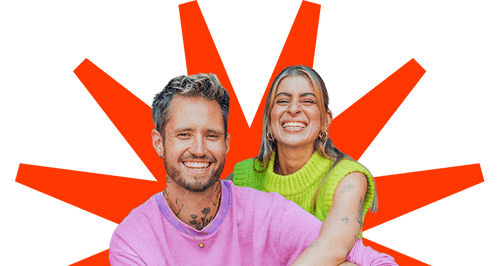 Portrait of kitsch and SASH, a DJ duo wearing colorful shirts and smiling warmly into the camera